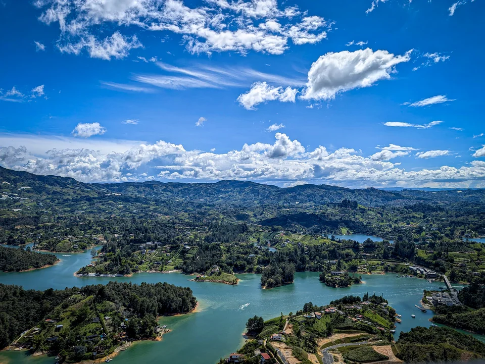 High view of a reservoir dotted with small green islands.
