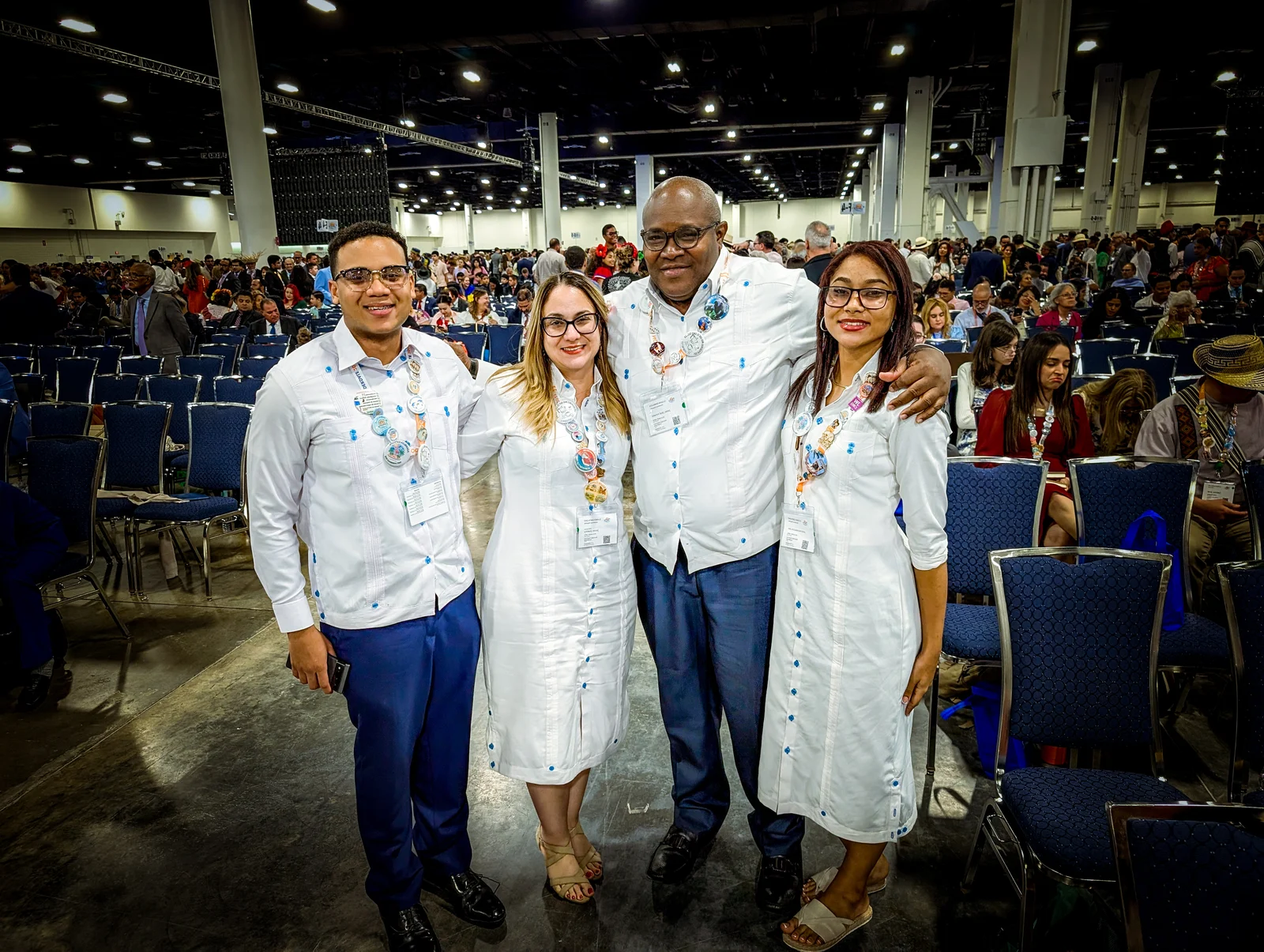 Jonás and his family in the auditorium of an international convention